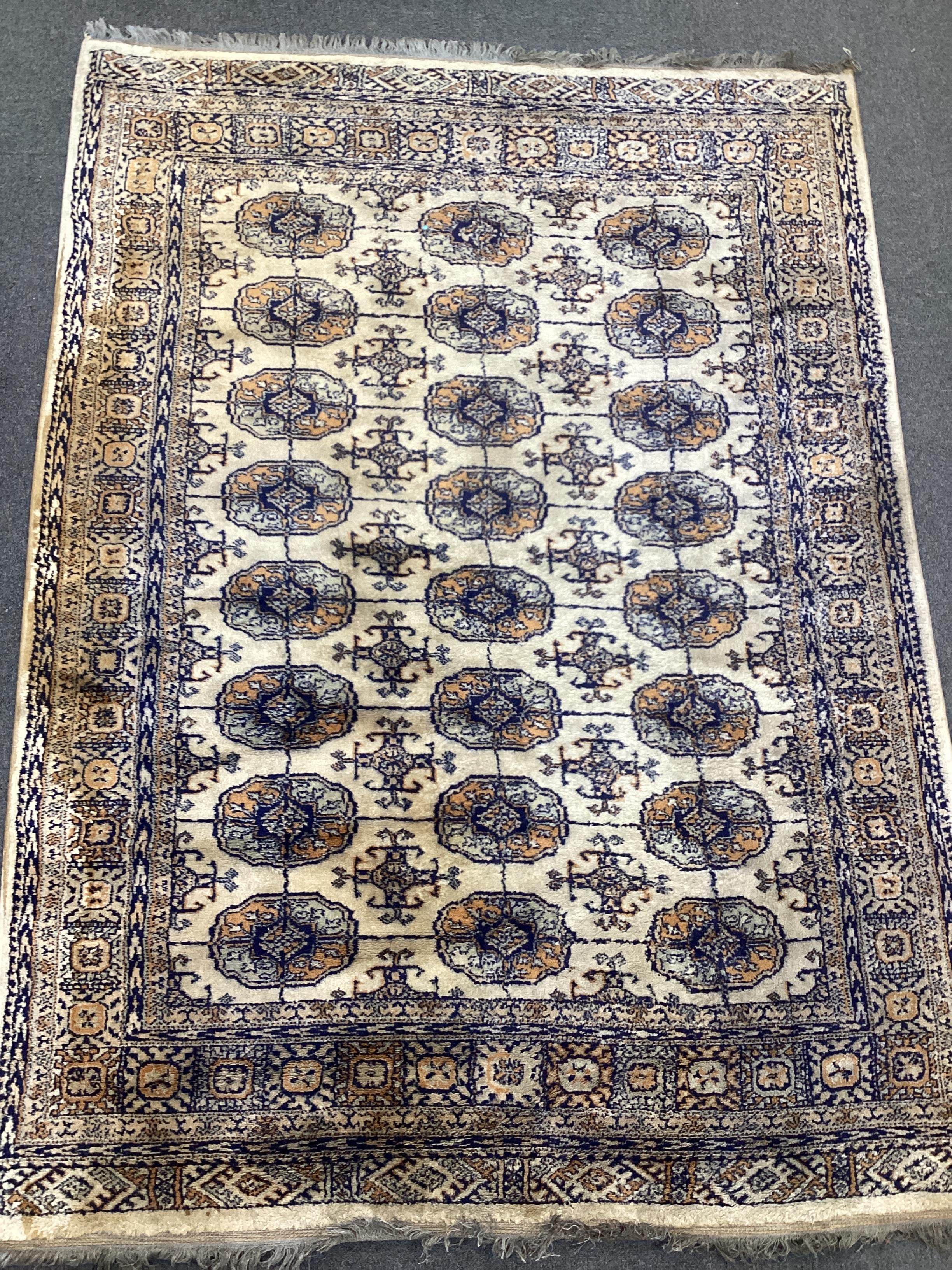 A Bokhara rug and a small Chinese rug, larger 180 x 132cm